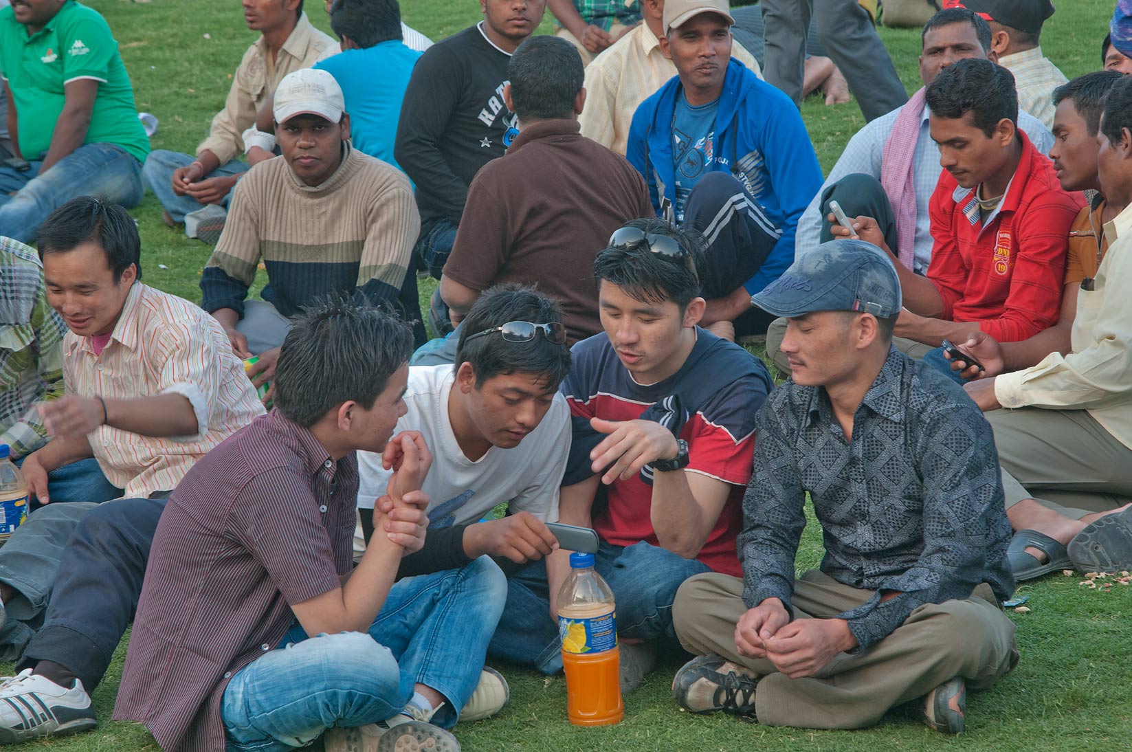 Three Men with the Mobile Phone